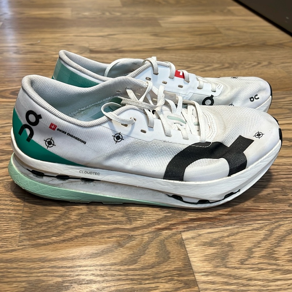 On Running White and Teal Athletic Shoes